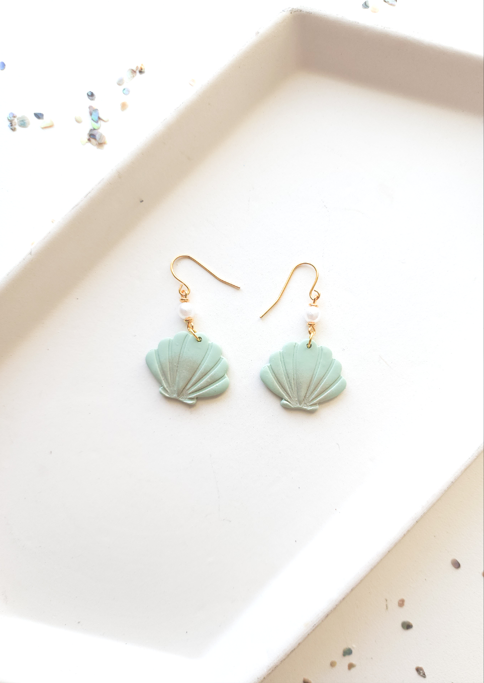 Green seashell and pearls dangles