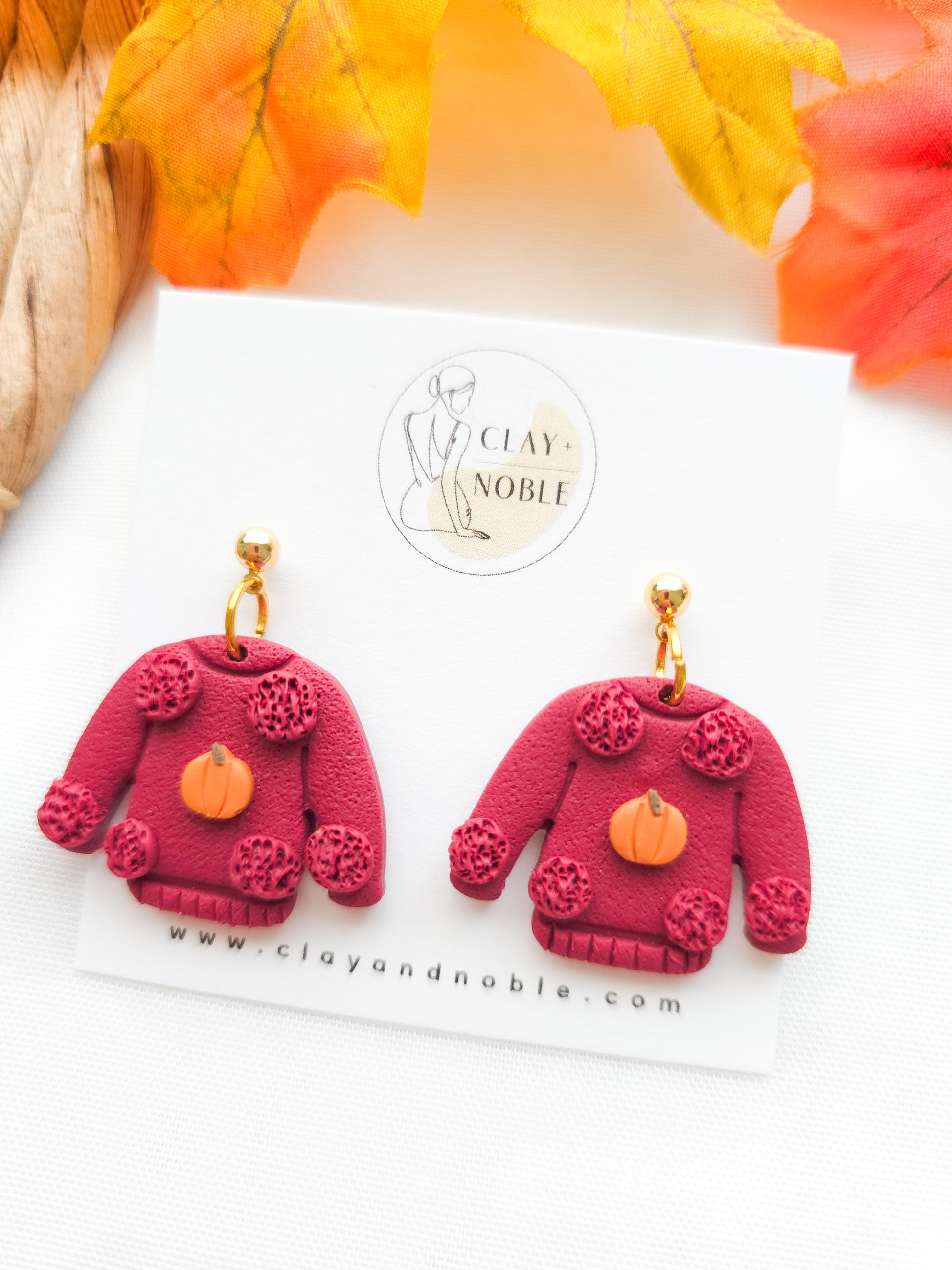 Cozy sweater dangles