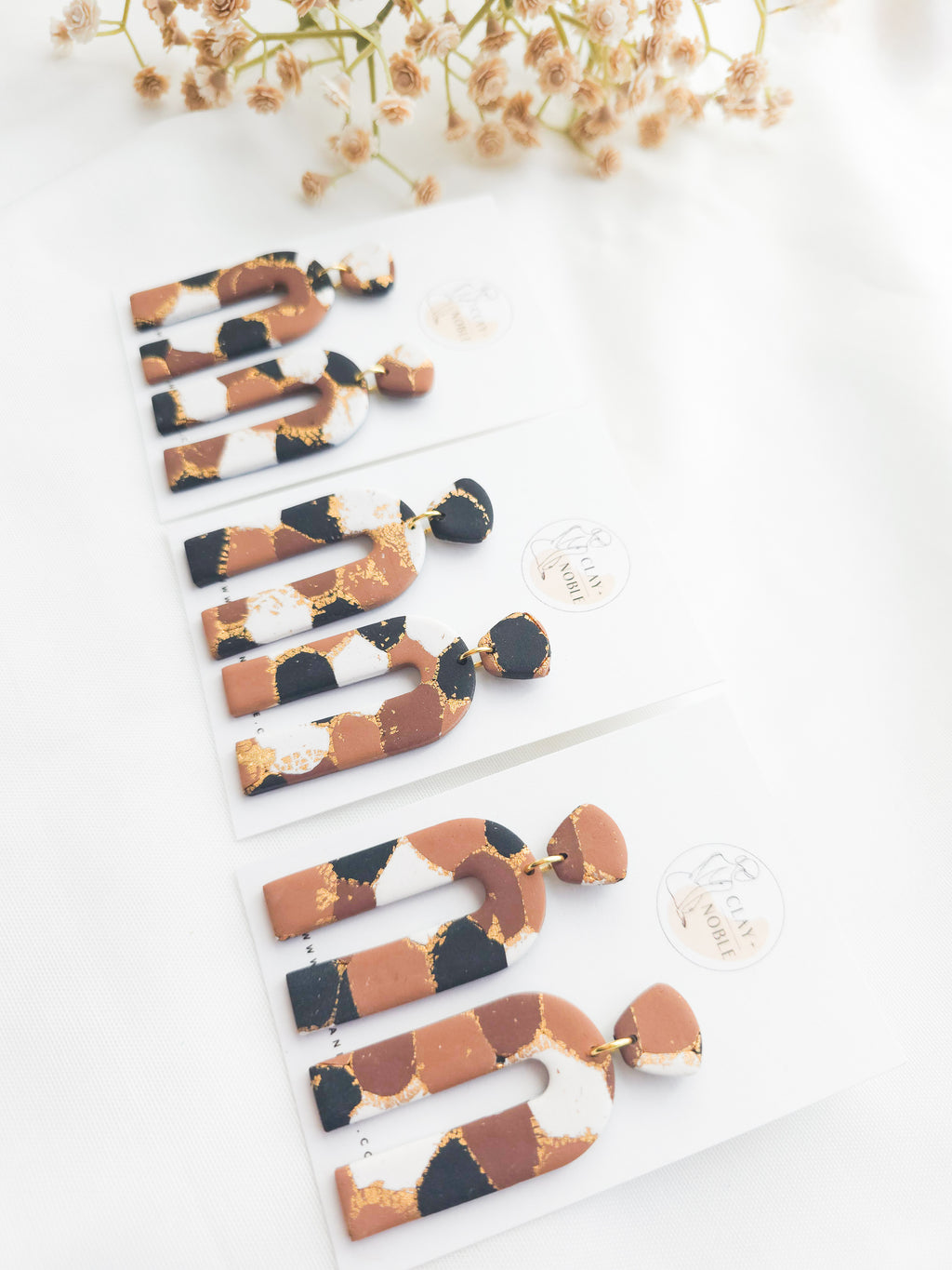 She is priceless dangles