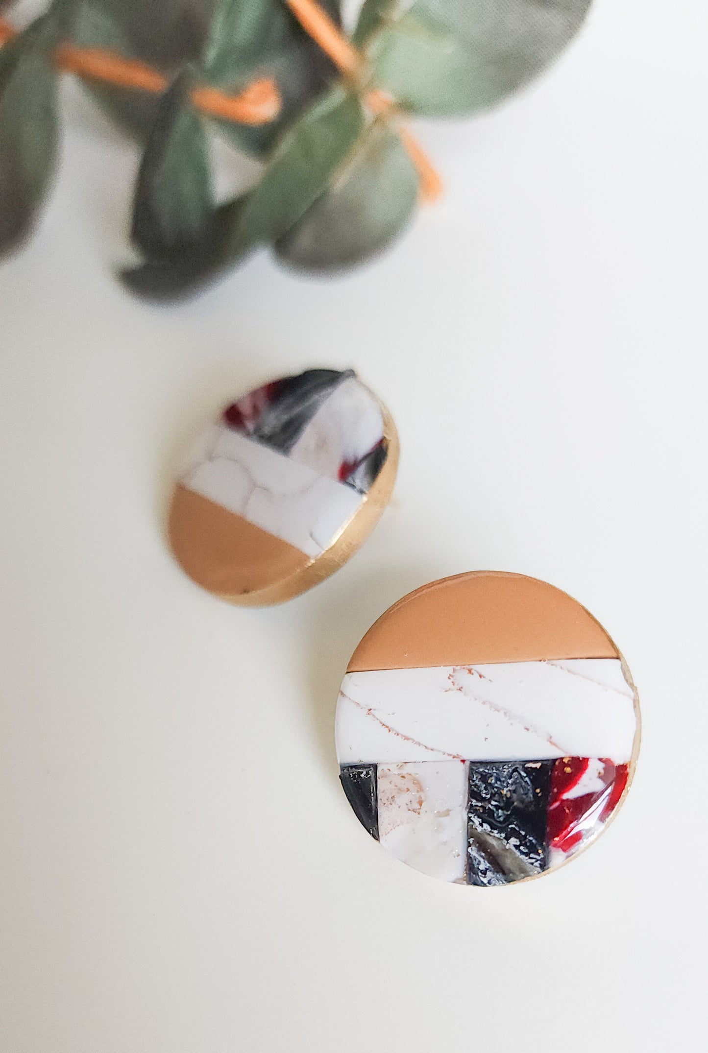 She is Pricless marbled statement studs