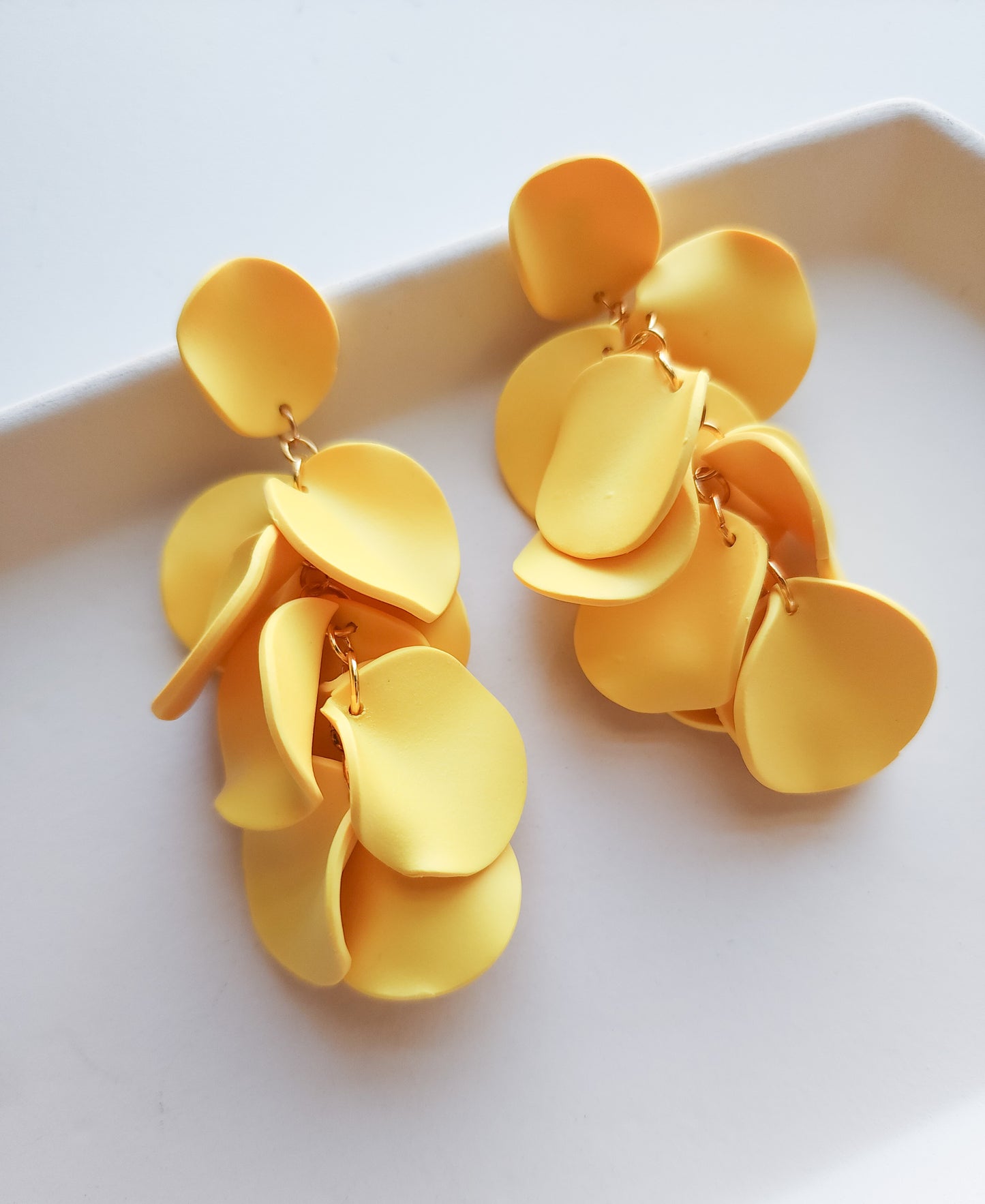 Yellow floral statement dangles